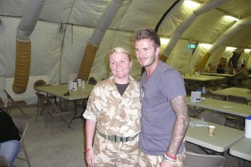 Maggie Tommony with David Beckham in the cookhouse in Iraq