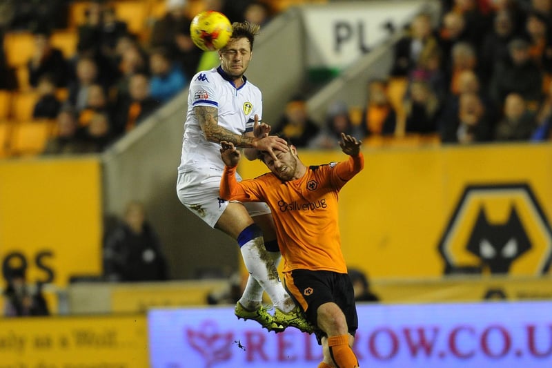 Liam Cooper rises above James Henry to win the header.
