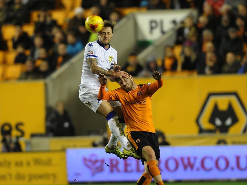 Liam Cooper rises above James Henry to win the header.