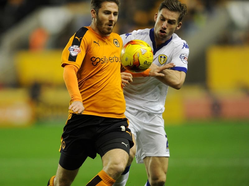 Charlie Taylor battles with Wolves midfielder James Henry.