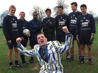 Leeds United playersAlfe Haaland, Lee Bowyer, Rod Wallace, Gary Kelly, Andy Gray, David Wetherall and Ian Harte admire the new suit worn by Daragh Corcoran.