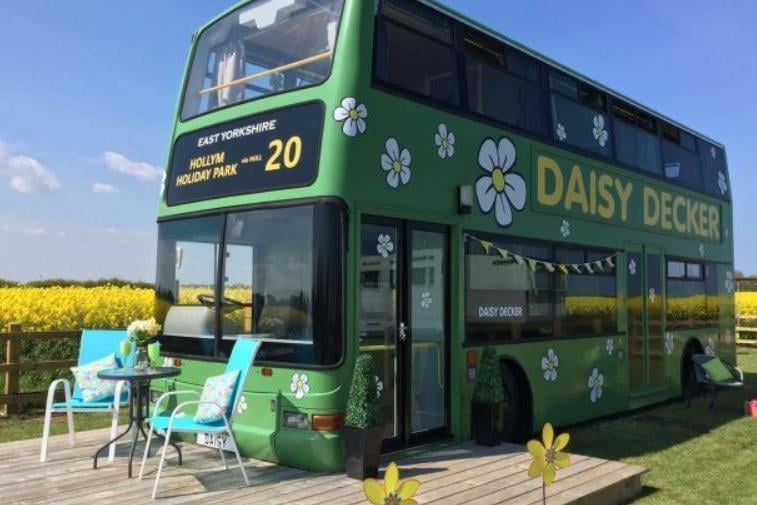 Hop aboard Daisy Decker, a vibrant double-decker bus converted into a five-bed holiday home. Equipped with two cosy bedrooms and the original bus seats (and driver's wheel) are in tact.