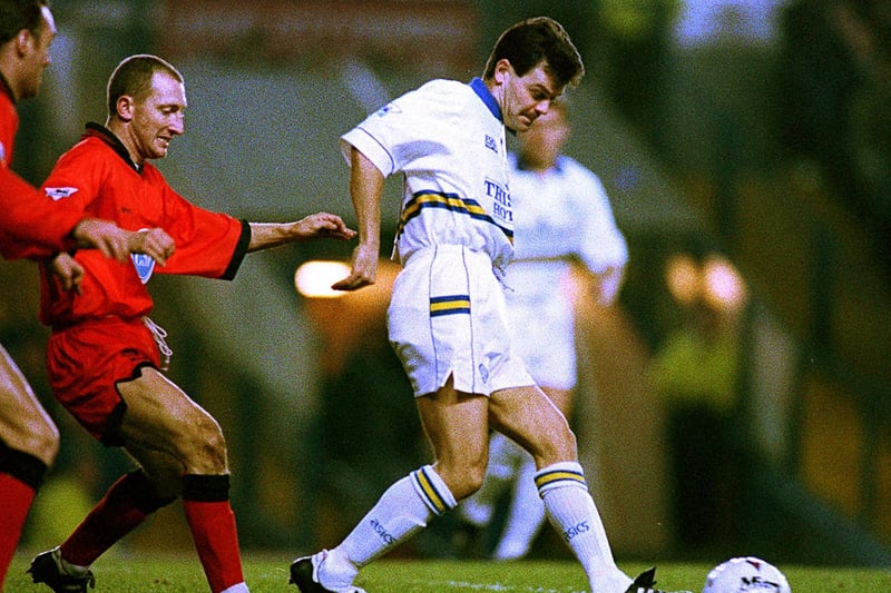 Steve Hodge gets the better of Ian Holloway during the clash with Queens Park Rangers at Elland Road in December 1993.