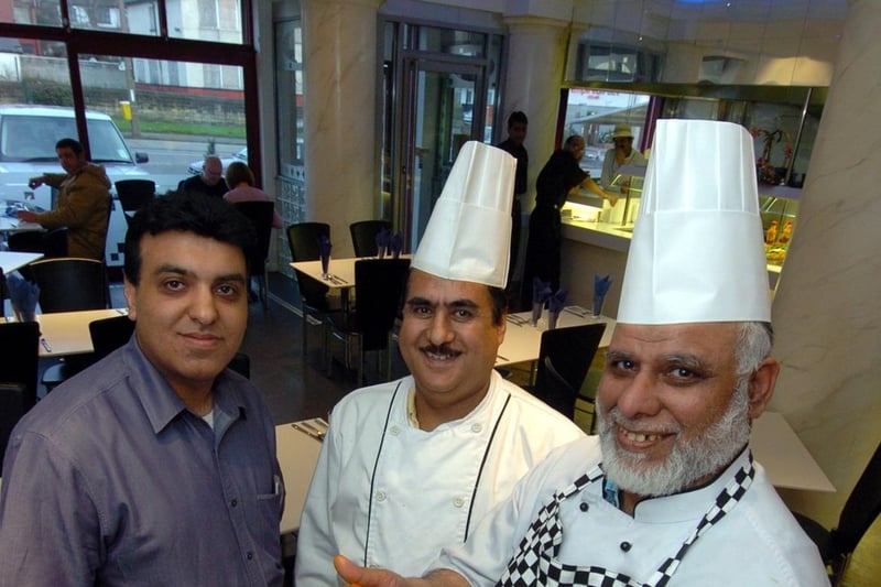 March 2005 and pictured is owner Saleem Ali (left) with head chef Mohammed Ramzan (right) and assistant Wazir Gul at the Dhesi Grill in Harehills.