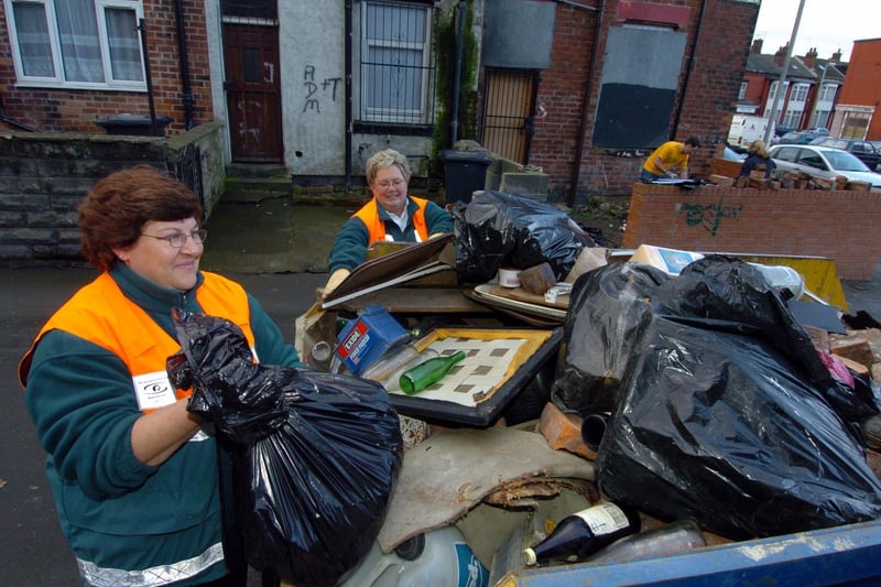 January 2005 and neighbourhood wardens Wendy Breakwell (left) and Gail Hardwick help fill a skip on Back Bellbrooke Place. They are pictured with volunteers Liam Breakwell and Emily Ramskill, from Leeds Community Safety (Alleygates Scheme).