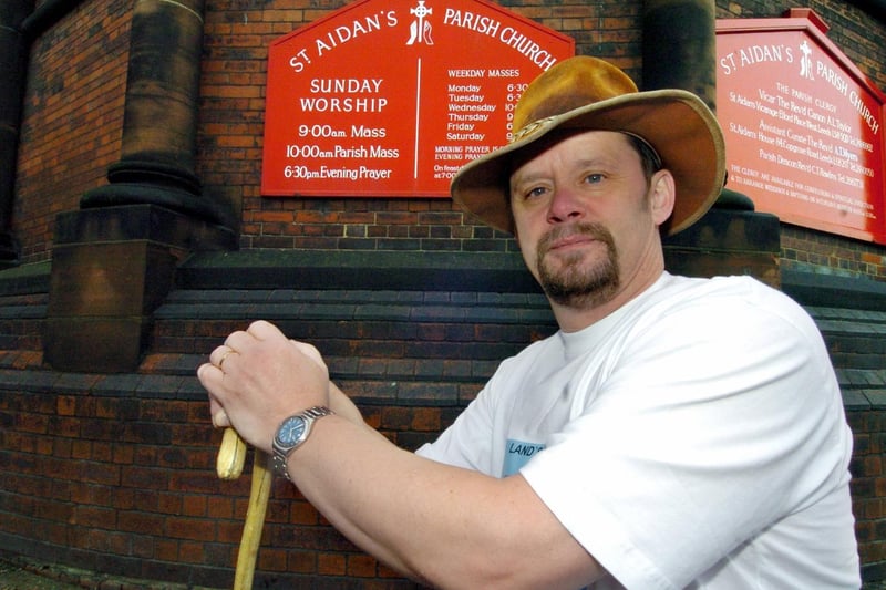 April 2005 and pictured at St Aidan's Church is John Drake who planned to walk from John O'Groats to Land's End.