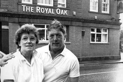 A press photograph of Maureen and Joe White outside the Royal Oak pub in Glass Houghton