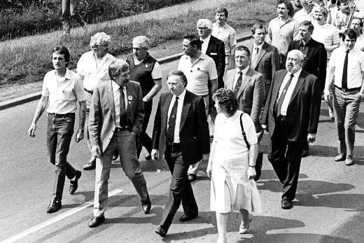 This press photograph shows Arthur Scargill at the head of a miners' march through Knottingley