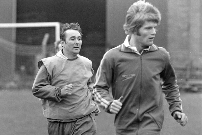 New Leeds United manager Brian Clough and Gordon McQueen during a training session.
