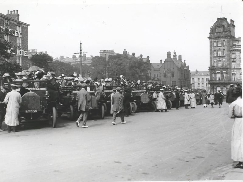 Charabancs at Scarborough Station, waiting to take holiday makers to the moors, Scarborough.