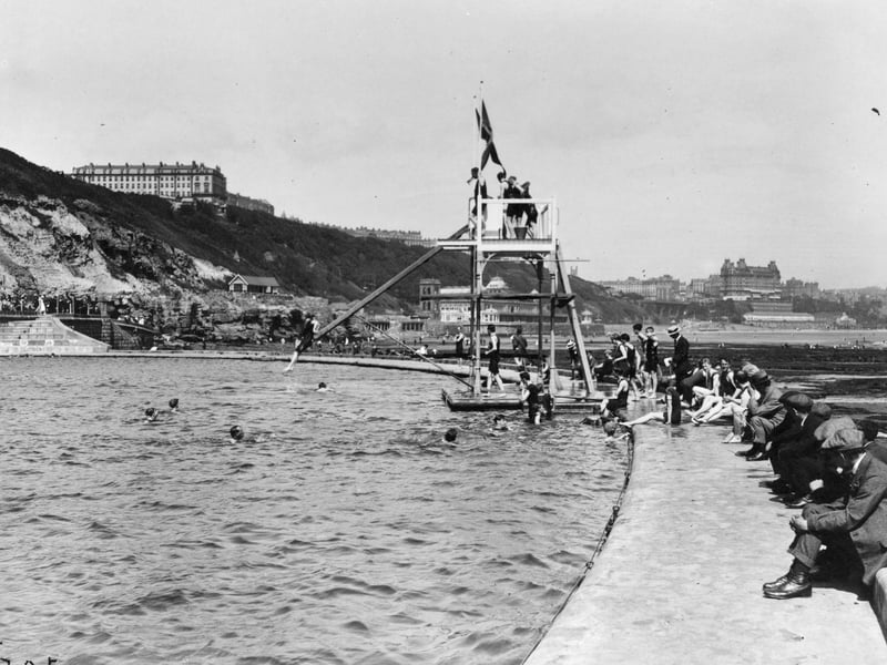 circa 1917: The diving board at the bathing pool at the South Cliff, Scarborough, Yorkshire.