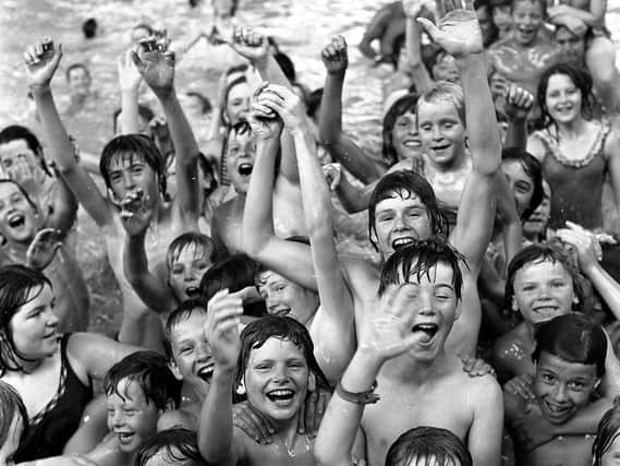 Lots of fun for youngsters enjoying Hindley swimming pool in 1976