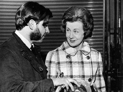 Barbara Castle stops to have a few words with Mr. Michael Austin who is working in the motor repair department after she opened a new Government Training Centre at Doncaster Road, Wakefield in 1970.