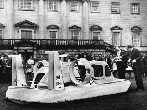 Stephen Hastings, MP for Mid Bedford, launches the hovercraft YYC III at Nostell Priory with a bottle of champagne in 1970