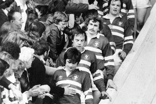 Dave Topliss, Graham Idle, Andrew Fletcher and Mike Lampowski are pictured as Wakefield Trinity players troop down the Wembley steps in 1979