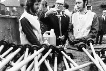 MP Denis Howell with workmen putting standpipes at Wakefield during the drought of 1976.
