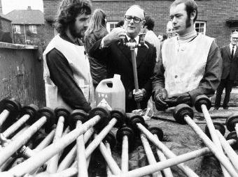 MP Denis Howell with workmen putting standpipes at Wakefield during the drought of 1976.