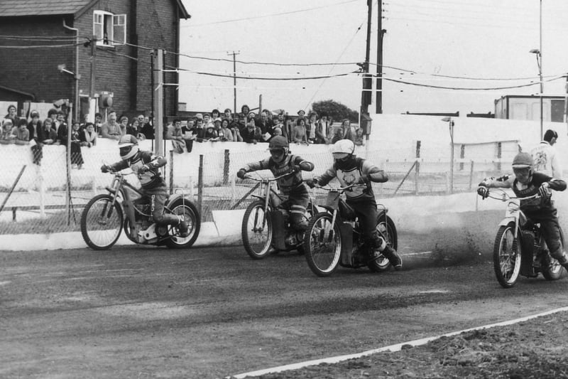 The tapes go up and crowds cheer as racing gets underway at Castleford's speedway for the second time on July 11, 1979.