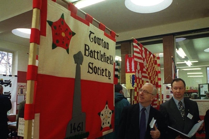 East Leeds MP George Mudie and David Owens, chair of Cross Gates Historical Society, looking at exhibits at the East Leeds Local History Fair being held at Cross Gates Library in December 1998.