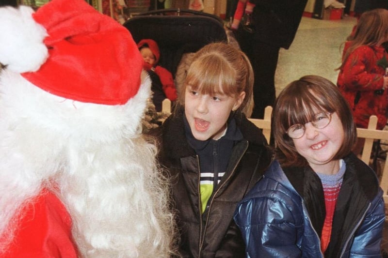 Young Simone Valentine and Holly Williams meet Santa at Crossgates Shopping Centre in November 1998.