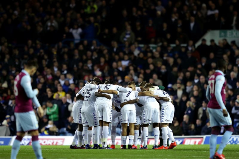 Leeds United go in a huddle prior to kick off in front of 32,648 fans at Elland Road.