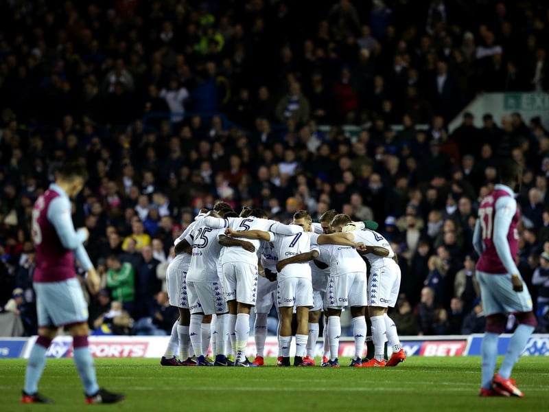 Leeds United go in a huddle prior to kick off in front of 32,648 fans at Elland Road.