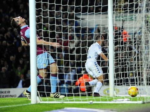 Kemar Roofe celebrates after scoring his first goal for Leeds United.