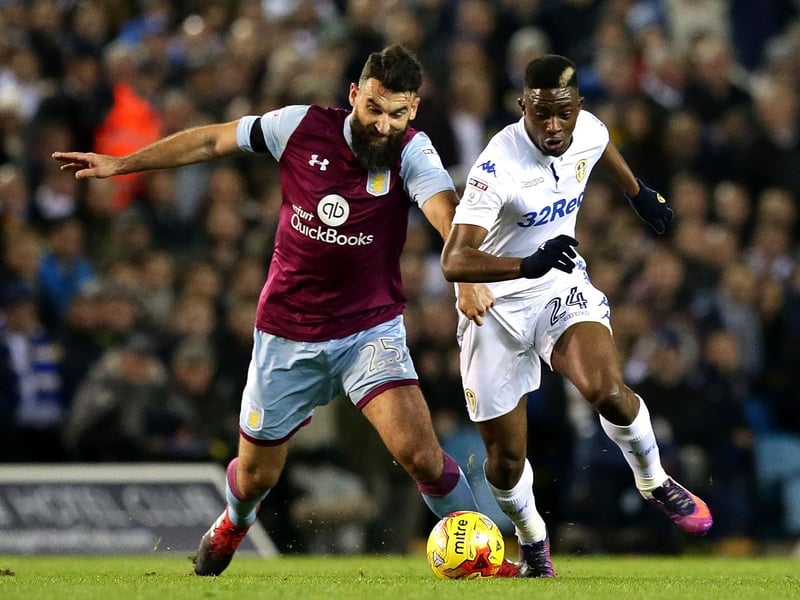 Hadi Sacko and Aston Villa's Mile Jedinak compete for the ball.
