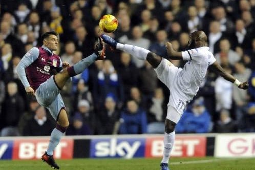 Souleymane Doukara goes toe to toe with Aston Villa's Ashley Westwood.
