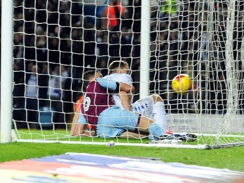 Chris Wood slides in to force Hadi Sacko's half-saved shot over the line deep into injury time.