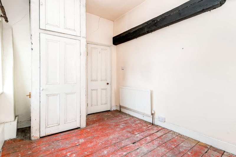 The fifth bedroom is the smallest but still has enough room for a double bed and has characterful features like exposed beams and a built in storage cupboard. It also boasts far reaching views of Leeds.