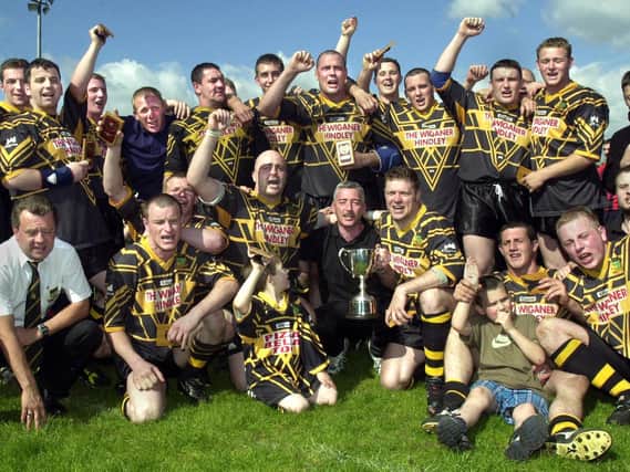 Hindley celebrate winning the Ken Gee Cup Final after beating St. Pat's "A" team 16-12 at Orrell on Sunday 10th of June 2001.