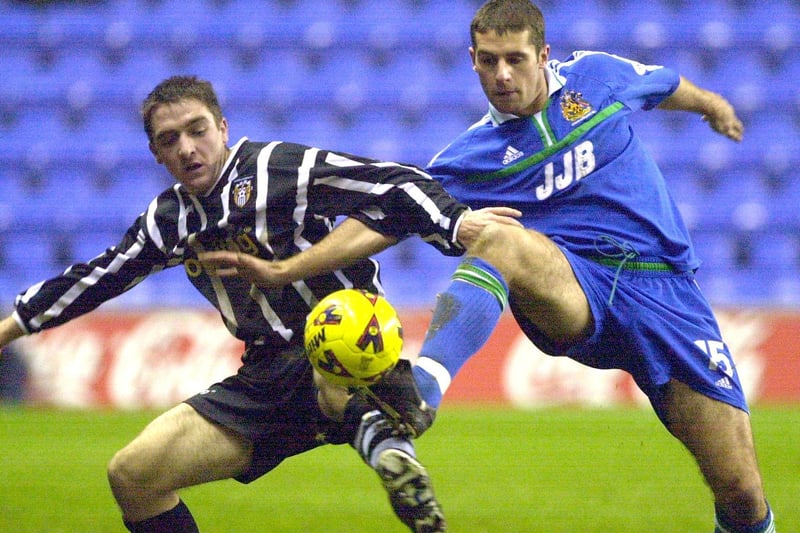 Wigan Atheltic v Notts County - Paul Mitchell and Paul Heffernan go for the ball - 2001.