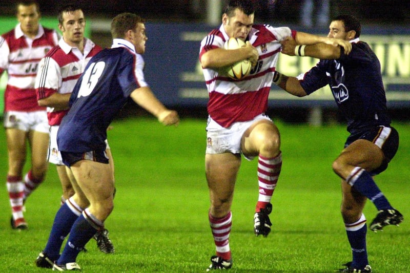 Wigan Warriors Francis Stephenson charges at the Bradford defence - 2001.