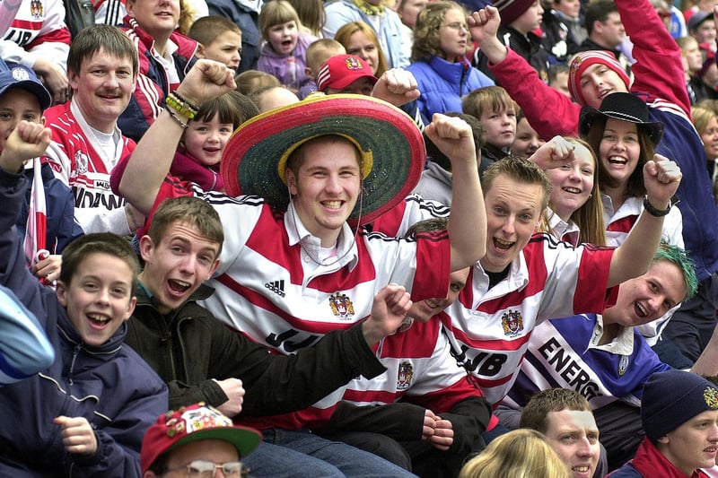 Wigan Warriors fans in good spirits during the Good Friday Super League clash against St. Helens at the JJB Stadium on 13th of April 2001.  The match was a 22-22 draw.