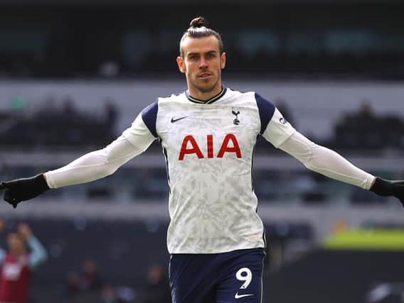 Gareth Bale of Tottenham Hotspur celebrates after scoring their side's first goal during the Premier League match between Tottenham Hotspur and Burnley at Tottenham Hotspur Stadium on February 28, 2021 in London, England.