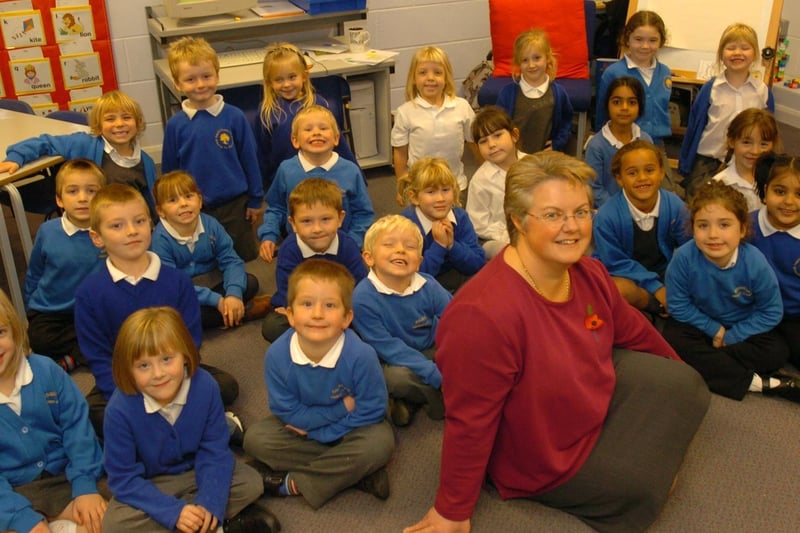 November 2004 and pictured is headteacher Gill Austerfield with children from Year 1 at Asquith Primary School.