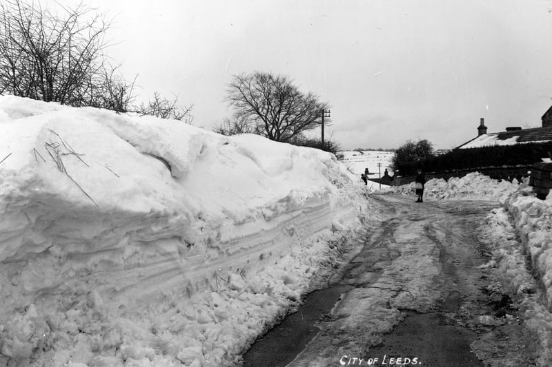 This snowfall had begun on February 2, 1947. This is Eccup Lane five days after ploughing with a heavy angle bulldozer.