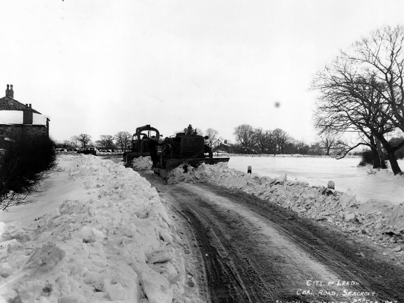 Snow ploughs clear snow from Coal Road at Seacroft.