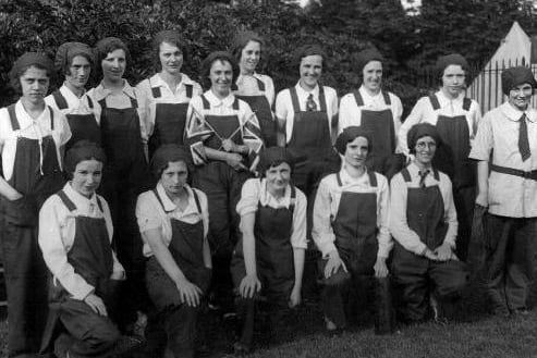 This photograph is from a series taken by the Wakefield Express showing the 1933 Wakefield Pageant, these women are playing First World War munitions workers