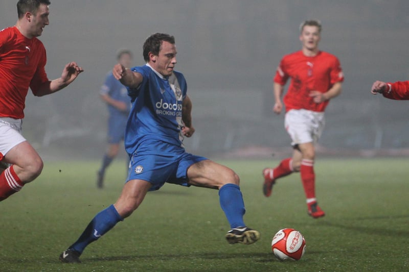 Halifax Town's Danny Holland on the attack against Stocksbridge