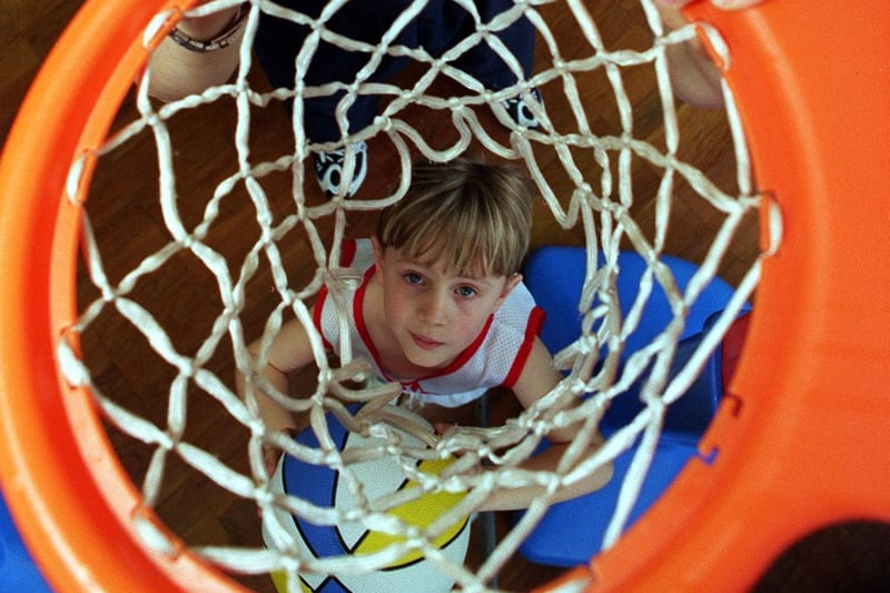The Sheffield Sharks basketball team visited Beeston Primary in march 1999. Pictured is pupil Curtis Naylor.