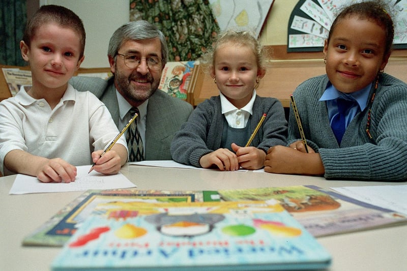 Beeston Hill Primary was celebrating a very good Ofsted report. Pictured, left to right, are Jack Doyle, headteacher Eric Whitehouse, Lucy Smith and Hollie Holdsworth-Watson.