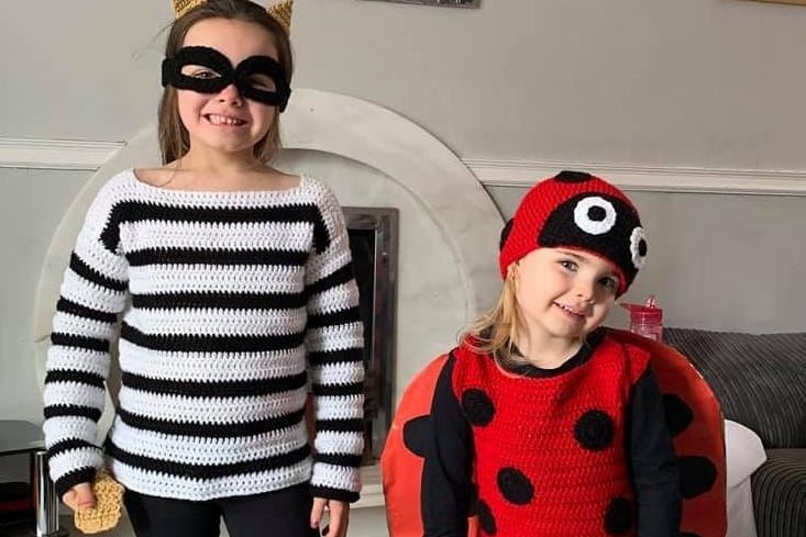 Holly, age 6, as Kitty Le Claw from Shifty McGifty and Slippery Sam: The Cat Burglarand Grace, age 4, as the ladybird from What the Ladybird Heard. Picture:Steph Houghton.