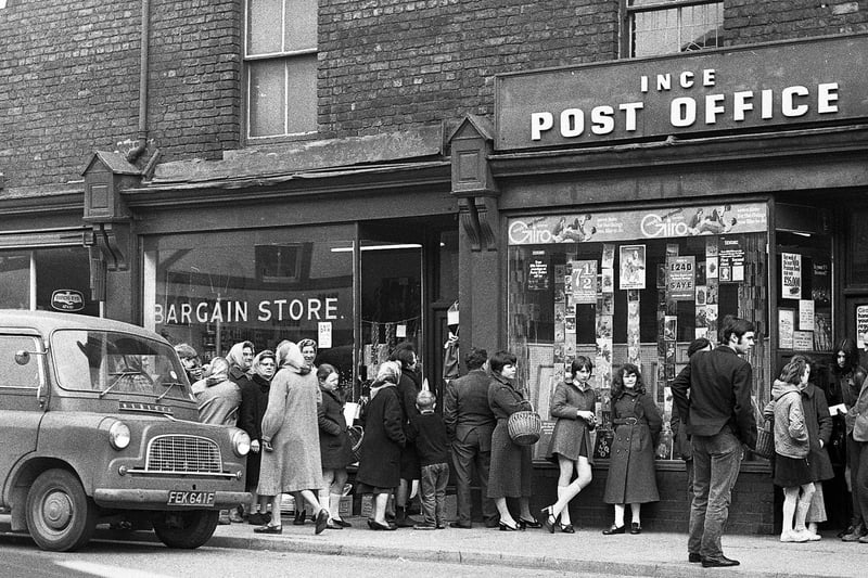 A queue outside Higher Ince Post Office on Manchester Road in April 1971