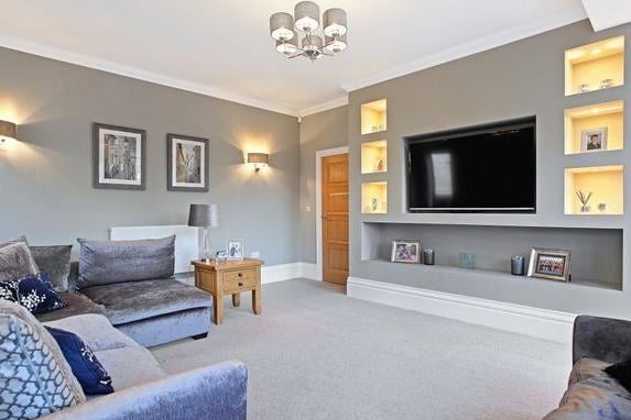 As well as a living room and family room, the home features a snug/office space with dual aspect double glazed windows, feature housing for television with display shelving and a central heating radiator.