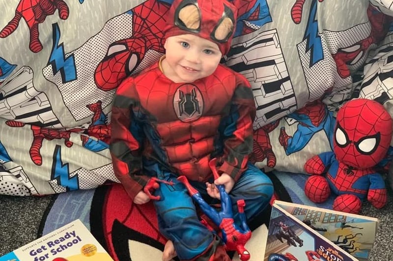 Kirsten Gartside shared her photo of Spiderman Max with his new books.