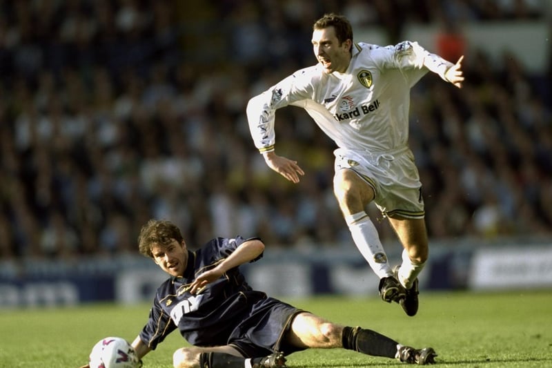 Jason Wilcox jumps over the challenge of Wimbledon's Kenny Cunningham during the FA Carling Premiership clash at Elland Road. Leeds won 4-1.