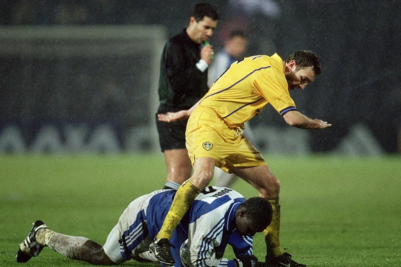 November 2001 and Jason Wilcox tangles with Bouba Papa Diop of Grasshopper during the UEFA Cup third round first leg clash at the Hardturm Stadium in Zurich, Switzerland. Leeds won 2-1.