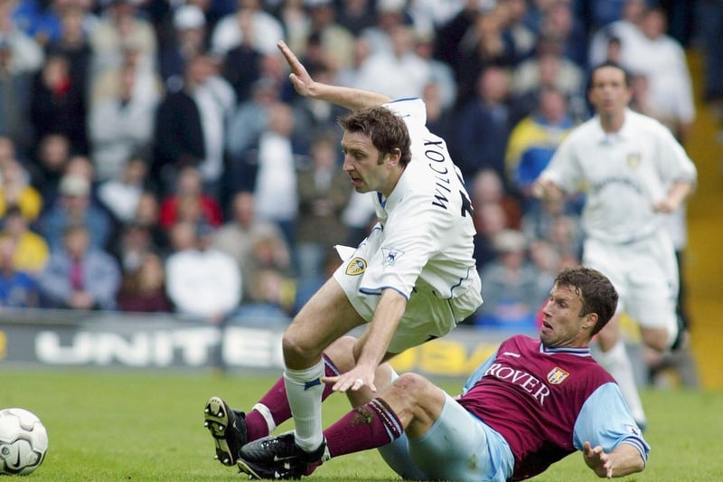 Jason Wilcox is brought down by Aston Villa's Gareth Barry during the FA Barclaycard Premiership clash at Elland Road in May 2003.